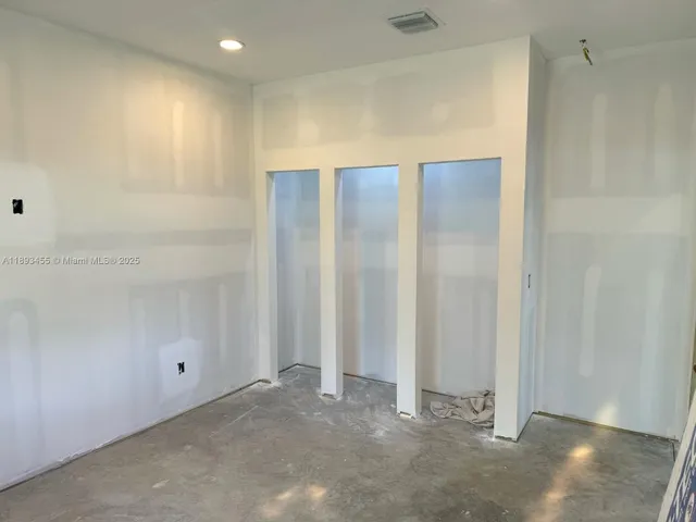 a view of swimming pool from a lake view