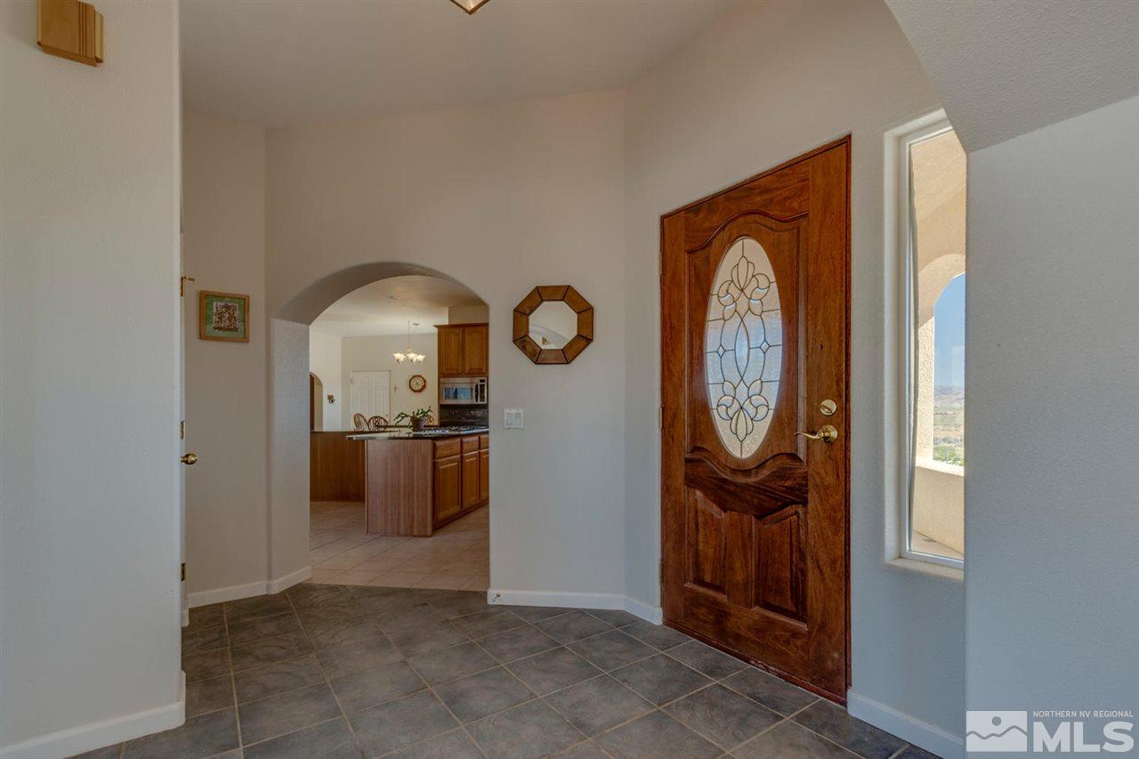 7005 Grass Valley Road Reno, NV 89510 - Photo 3 of 25 a view of entryway with washer and dryer