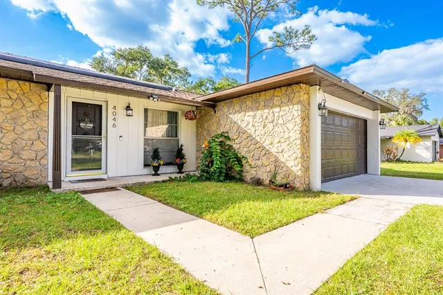 a view of a back yard of the house