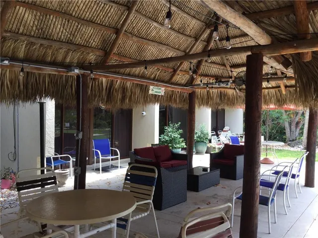 a view of a car is parked on the side of the road