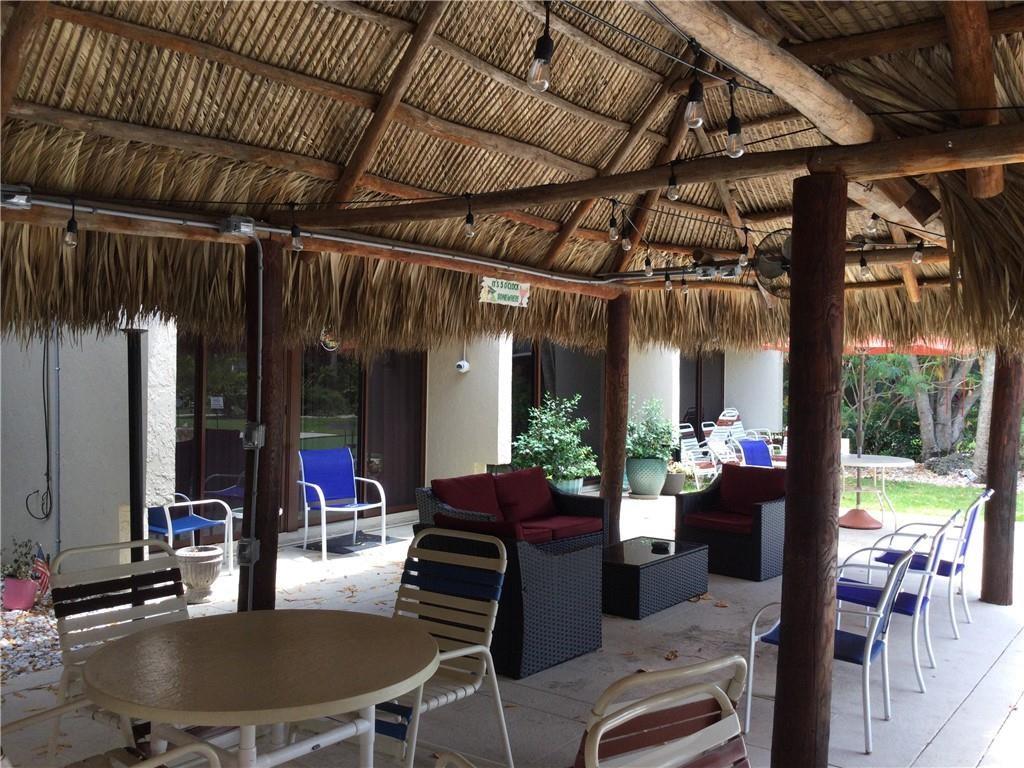 777 South Federal Highway, Unit 511RP Pompano Beach, FL 33062 - Photo 27 of 37 a view of a porch with chairs and couches