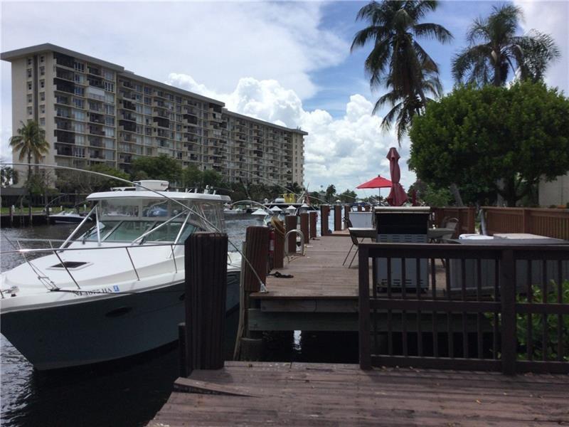 777 South Federal Highway, Unit 511RP Pompano Beach, FL 33062 - Photo 33 of 37 a view of a roof deck with couches and wooden floor