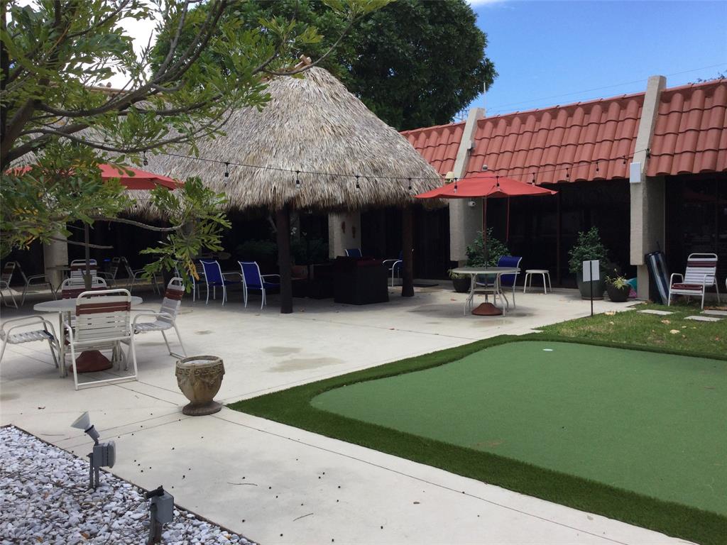 777 South Federal Highway, Unit 511RP Pompano Beach, FL 33062 - Photo 35 of 37 a view of a swimming pool with a patio