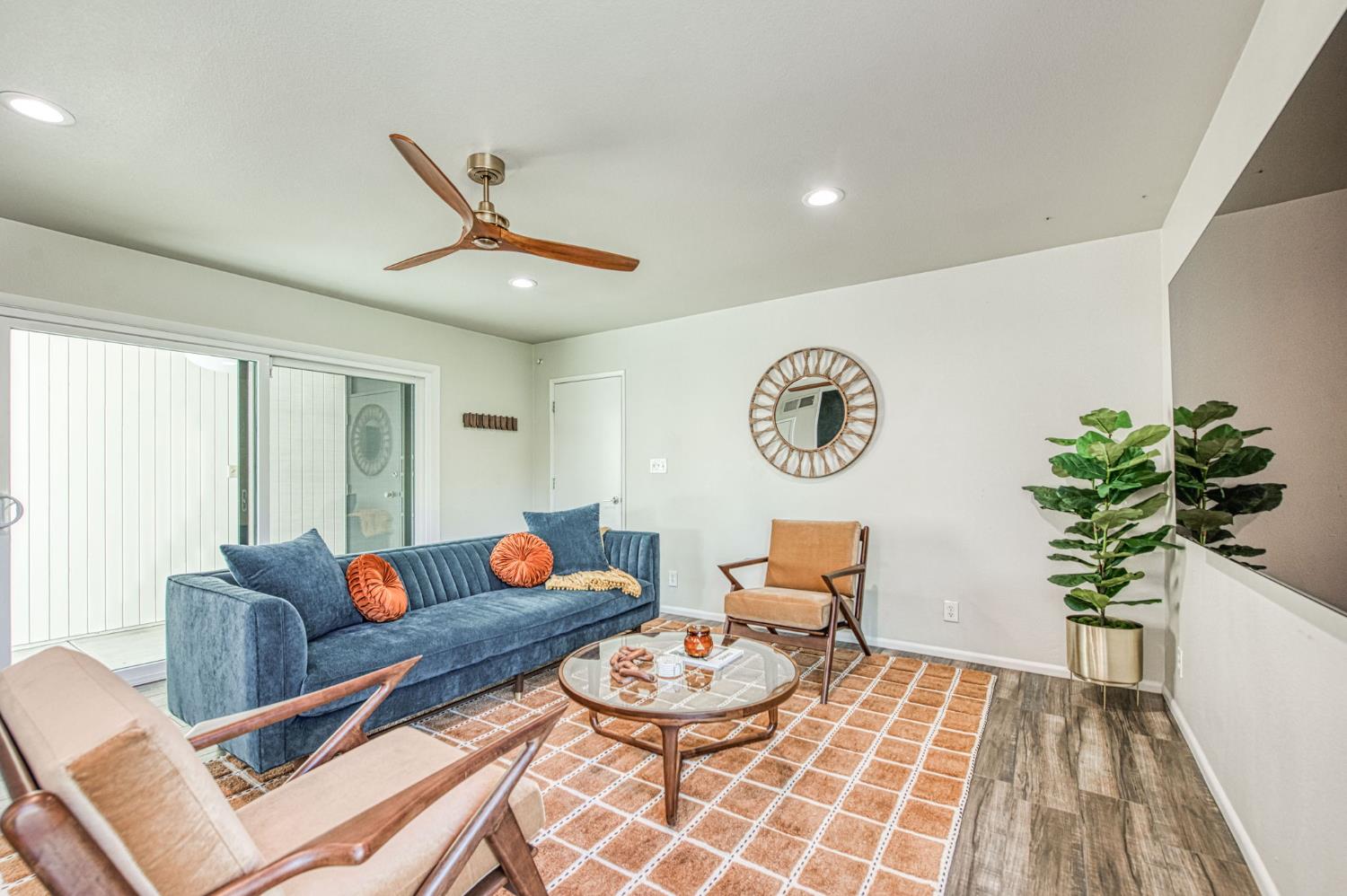 1527 West San Ramon Avenue Fresno, CA 93711 - Photo 11 of 55 a living room with furniture and a table