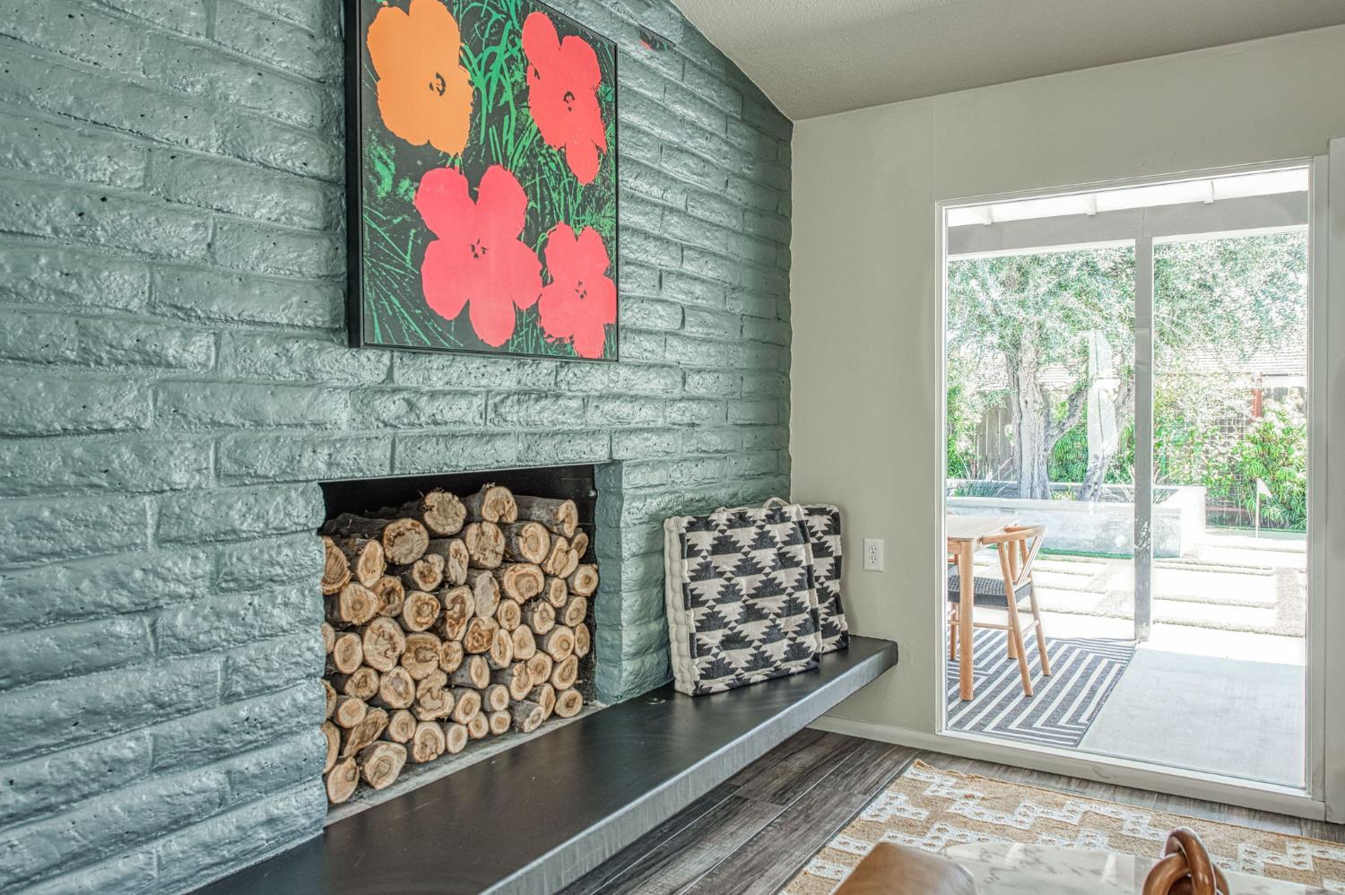 1527 West San Ramon Avenue Fresno, CA 93711 - Photo 23 of 55 a room with furniture and a fireplace