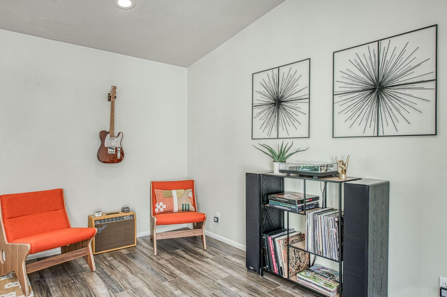 1527 West San Ramon Avenue Fresno, CA 93711 - Photo 24 of 55 a living room with furniture and floor to ceiling window