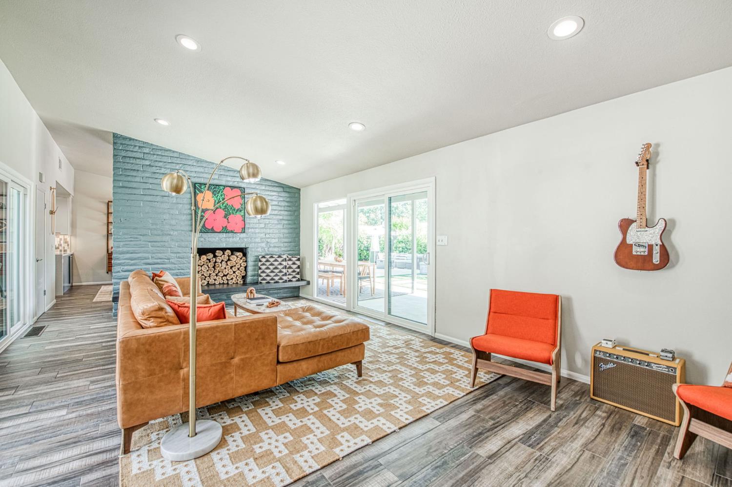 1527 West San Ramon Avenue Fresno, CA 93711 - Photo 25 of 55 a bed room with furniture and a flat screen tv