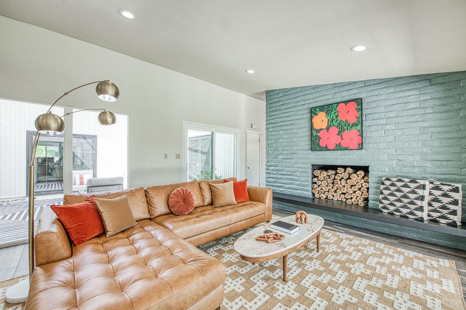 1527 West San Ramon Avenue Fresno, CA 93711 - Photo 26 of 55 a living room with furniture and wooden floor