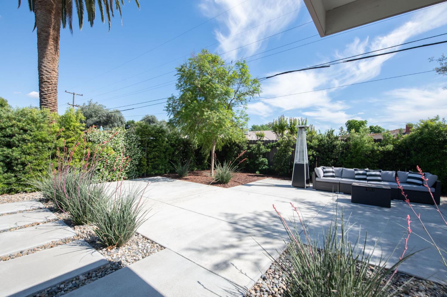 1527 West San Ramon Avenue Fresno, CA 93711 - Photo 46 of 55 a view of street with a yard