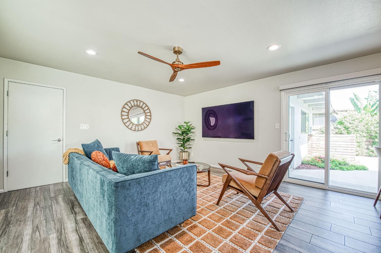 1527 West San Ramon Avenue Fresno, CA 93711 - Photo 9 of 55 a living room with furniture and a large window