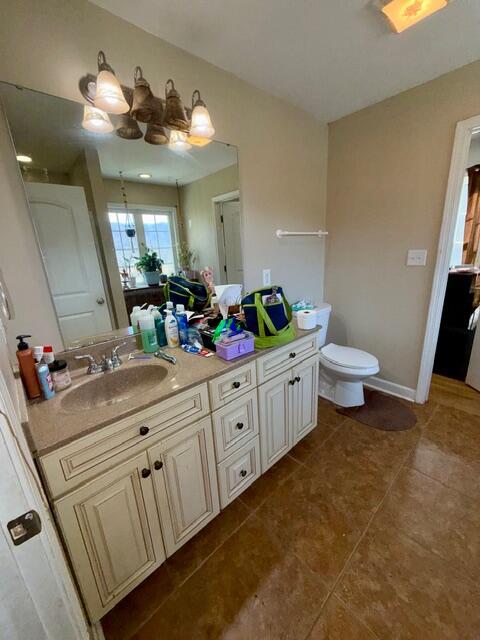 6267 Dillons Mill Road Callaway, VA 24067 - Photo 11 of 24 a bathroom with a sink vanity and a mirror