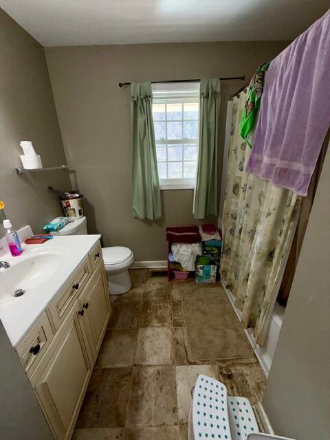 6267 Dillons Mill Road Callaway, VA 24067 - Photo 13 of 24 a bathroom with a sink a toilet and a shower
