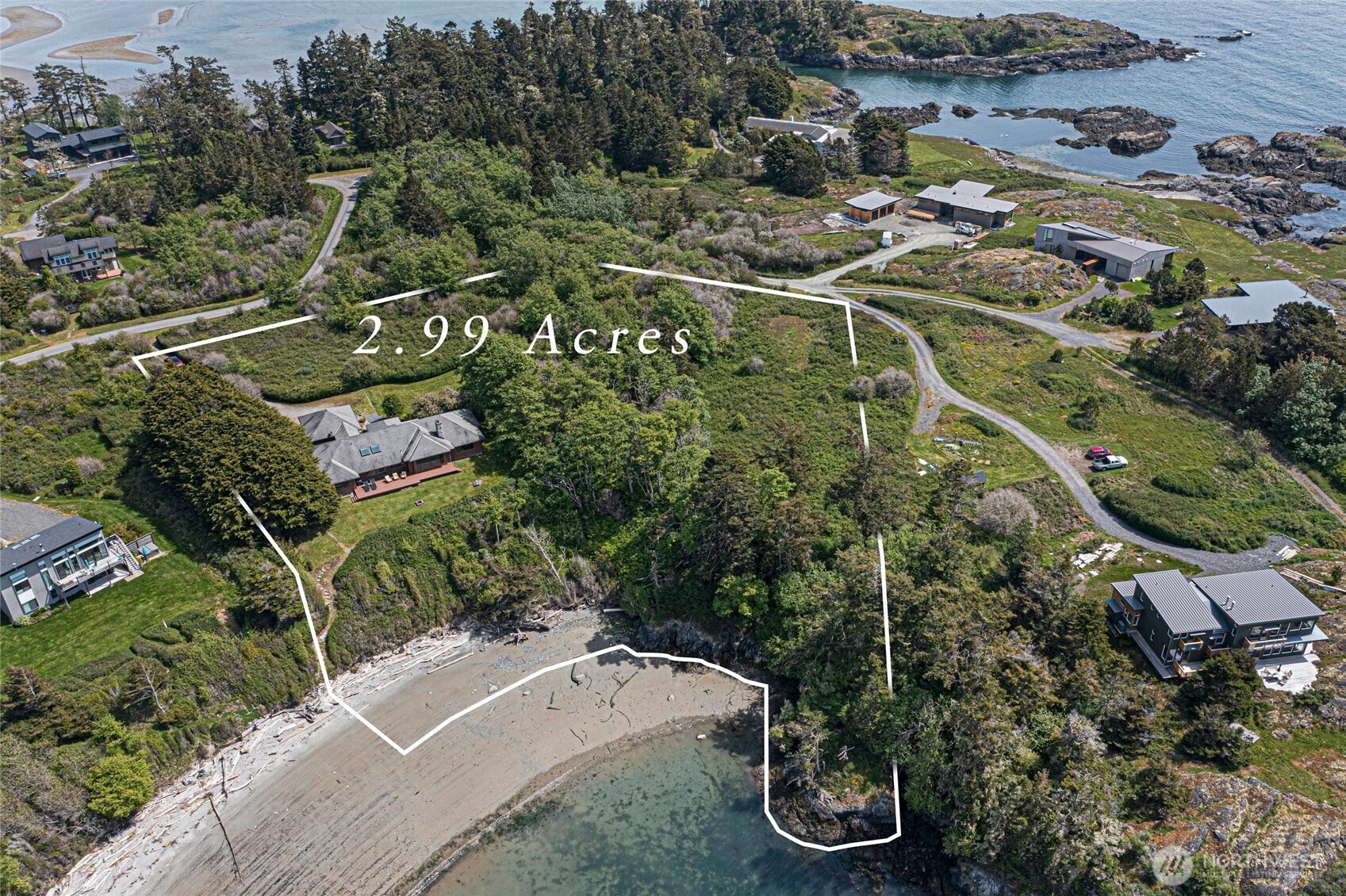 1248 Kanaka Bay Road Friday Harbor, WA 98250 - Photo 3 of 37 an aerial view of a house with a yard