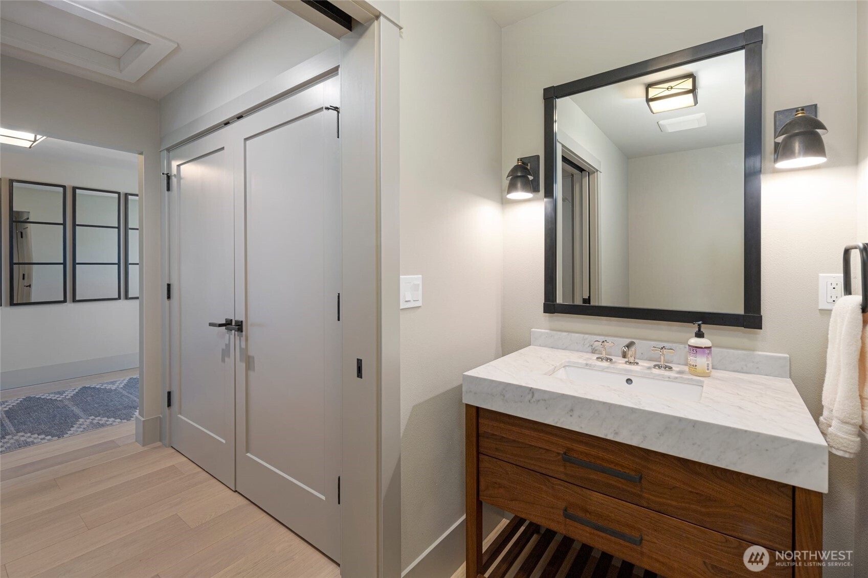 1248 Kanaka Bay Road Friday Harbor, WA 98250 - Photo 32 of 37 a bathroom with a sink vanity and mirror