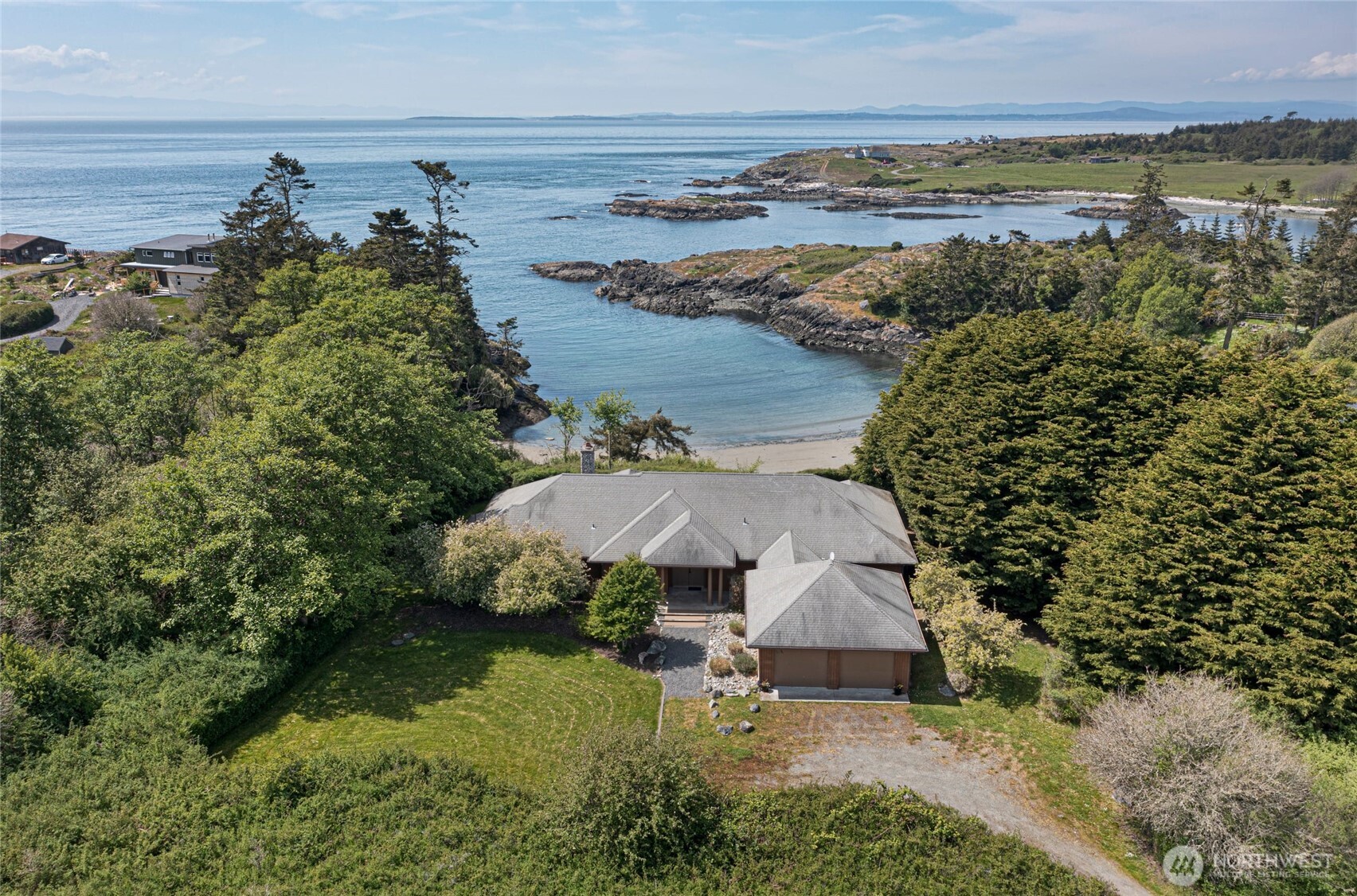 1248 Kanaka Bay Road Friday Harbor, WA 98250 - Photo 34 of 37 an aerial view of a house with a lake view