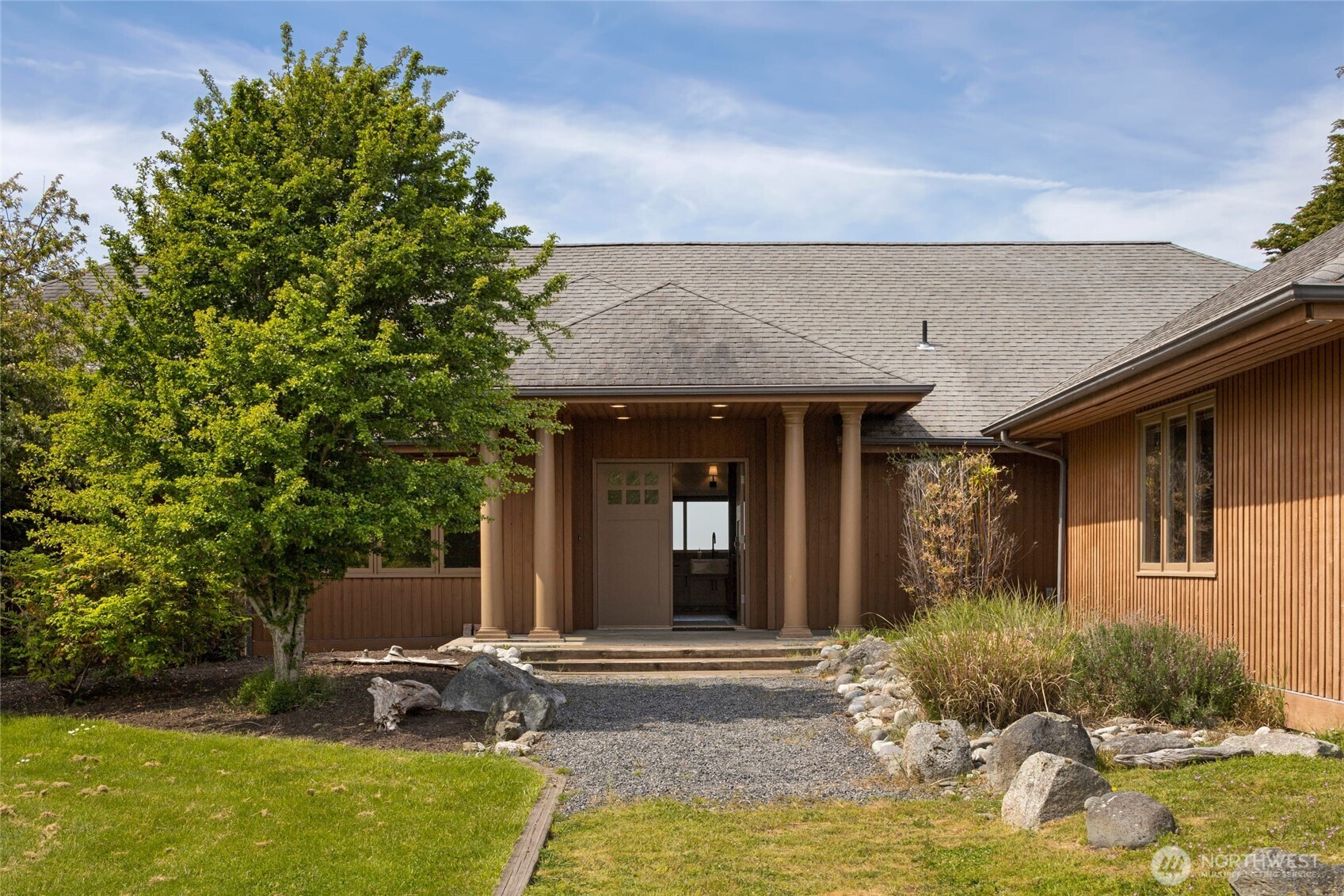 1248 Kanaka Bay Road Friday Harbor, WA 98250 - Photo 35 of 37 a view of a house with backyard porch and sitting area