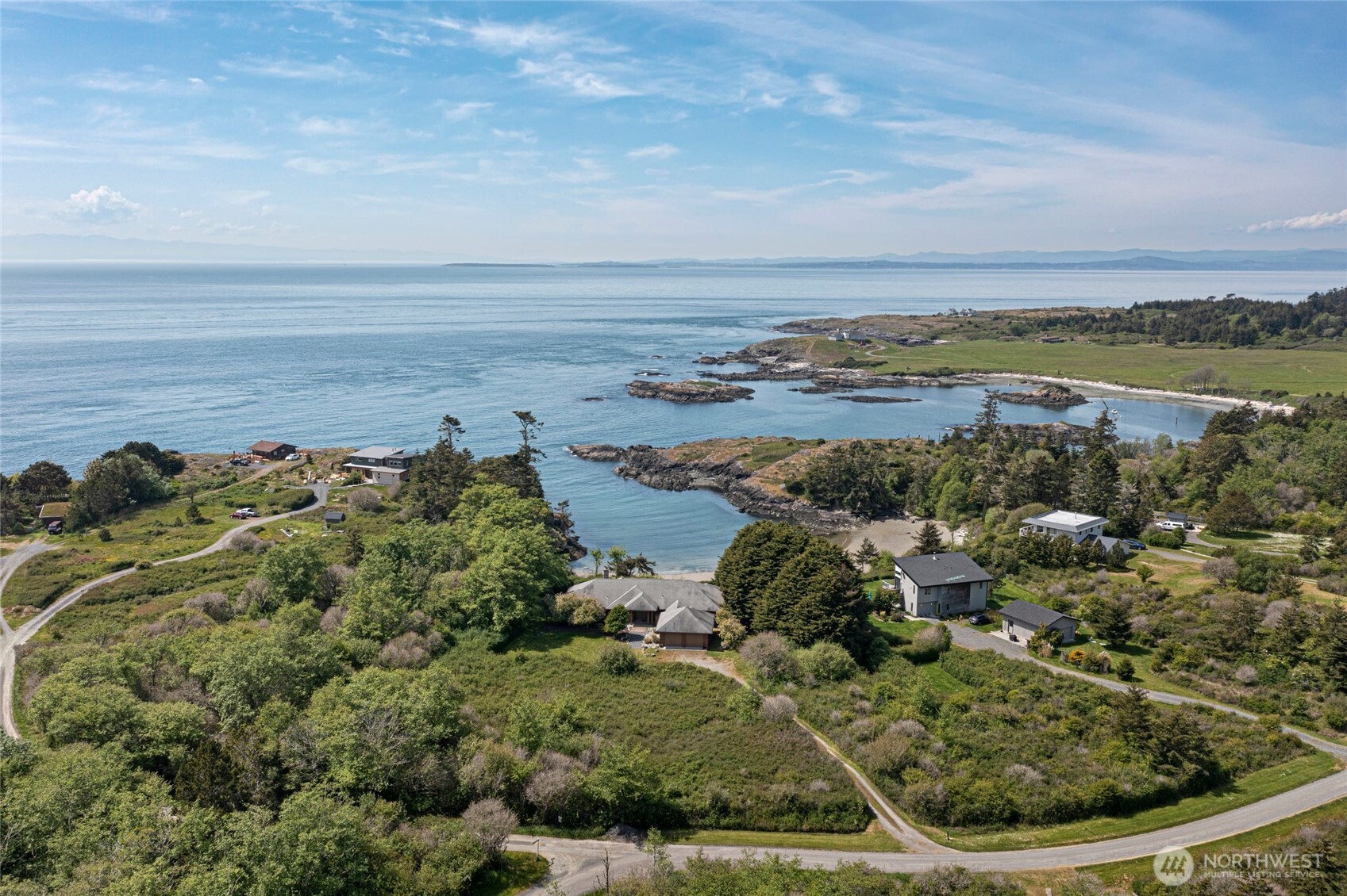 1248 Kanaka Bay Road Friday Harbor, WA 98250 - Photo 5 of 37 an aerial view of a houses with a lake view