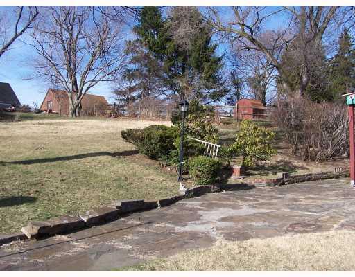 1438 Greentree Road Pittsburgh, PA 15220 - Photo 11 of 12 Yard/Garden. The property includes an additional parcel included in the sale.