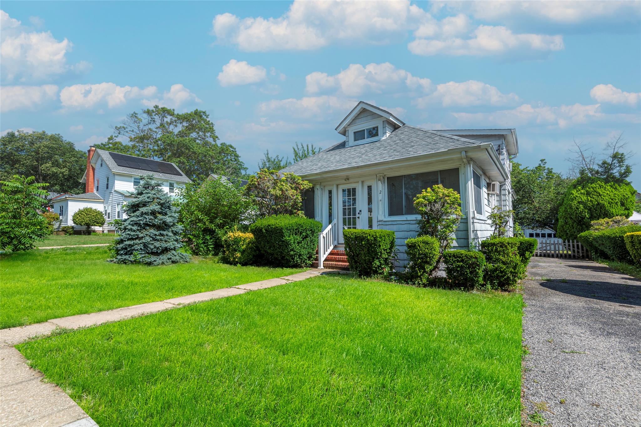 2 Florence Street Baldwin, NY 11510 - Photo 2 of 38 Bungalow with roof with shingles