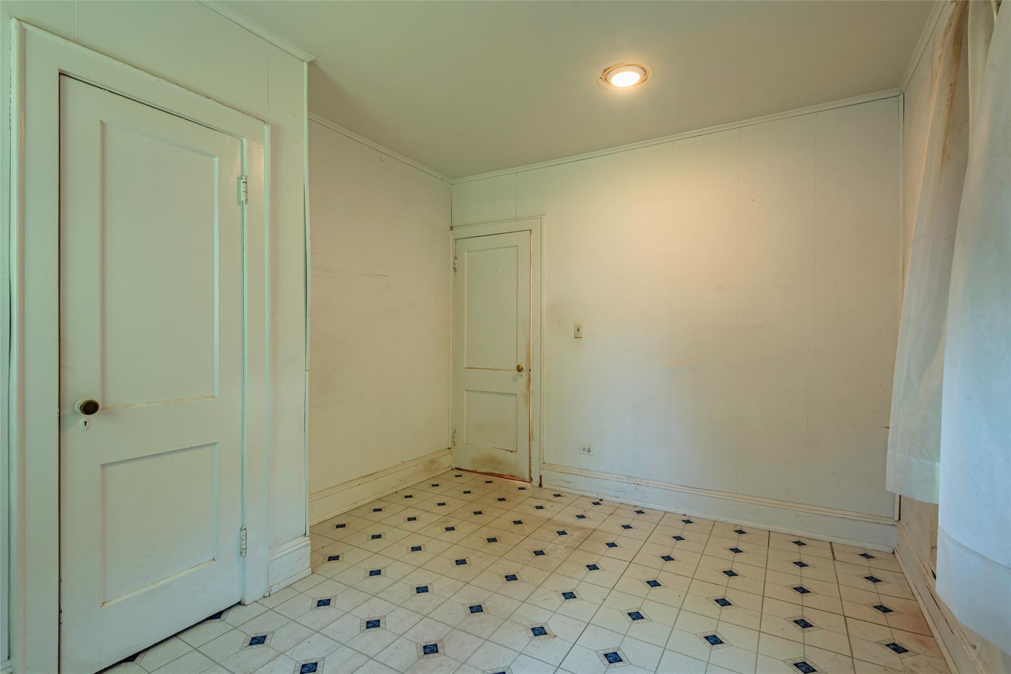 2 Florence Street Baldwin, NY 11510 - Photo 24 of 38 Empty room featuring crown molding and baseboards