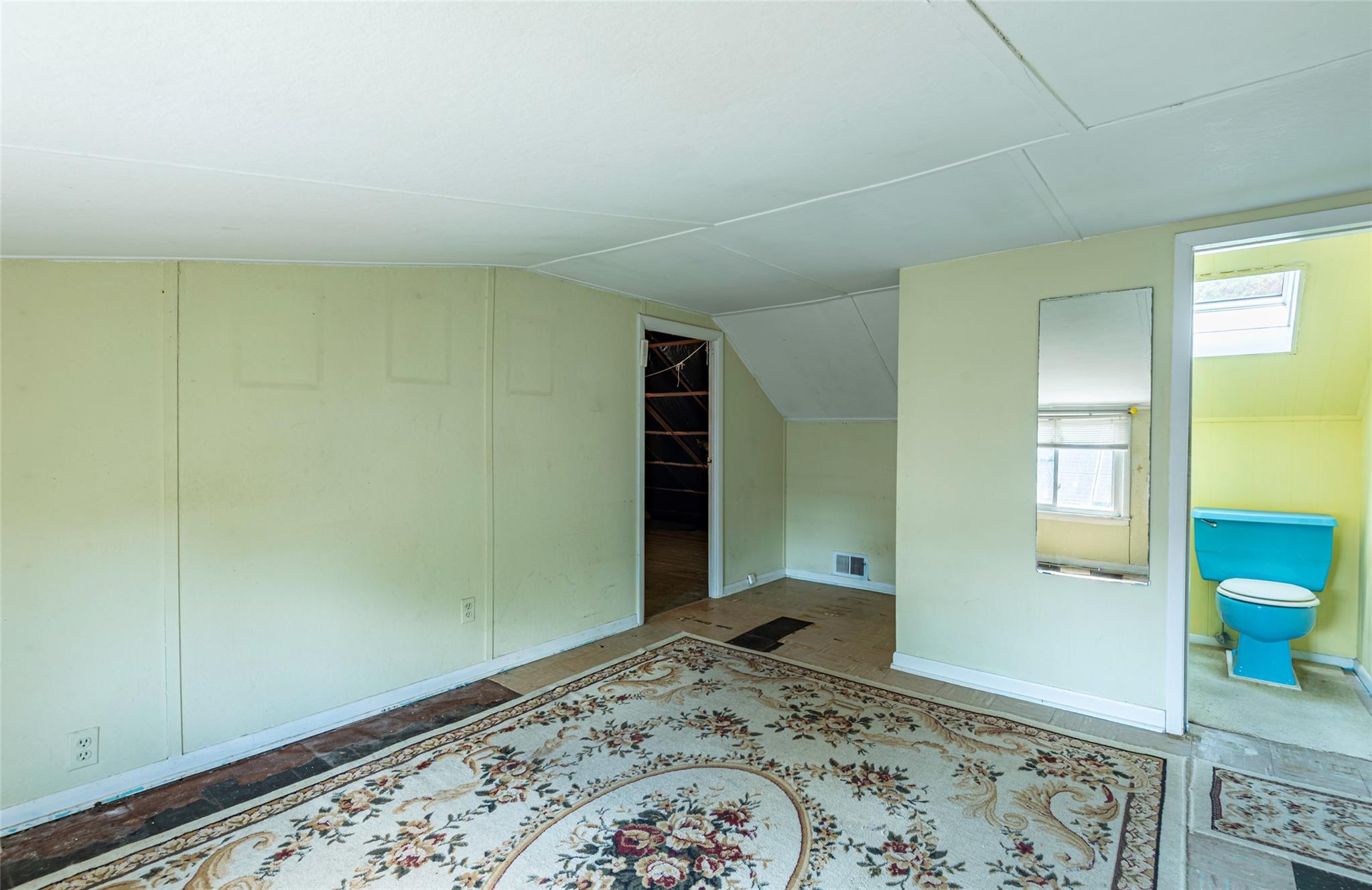 2 Florence Street Baldwin, NY 11510 - Photo 26 of 38 Additional living space with vaulted ceiling and baseboards