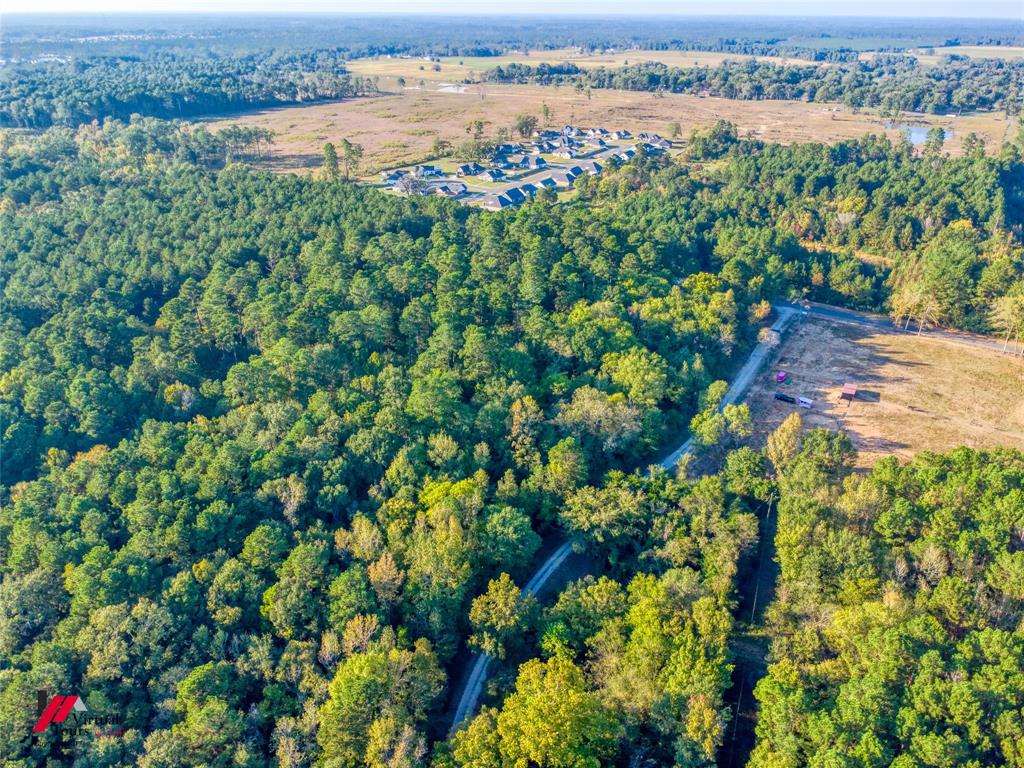 0 Stanley Road Stonewall, LA 71078 - Photo 17 of 26 a view of a lake with a house