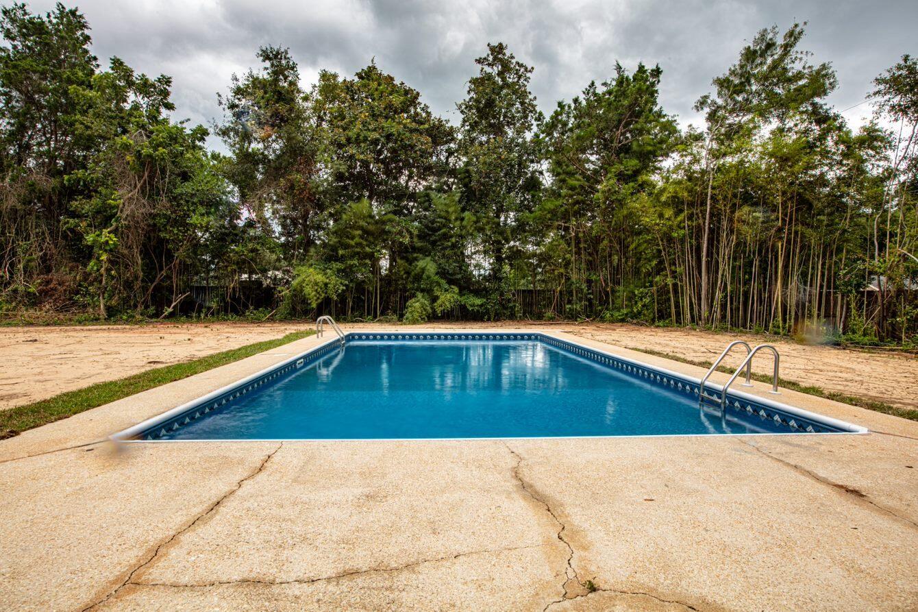 1414 Red Oak Drive Crestview, FL 32539 - Photo 32 of 34 a view of outdoor space and swimming pool