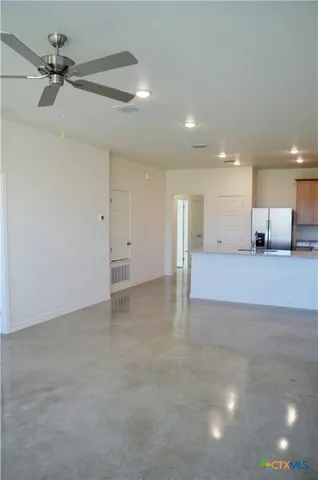 a view of a livingroom with a staircase