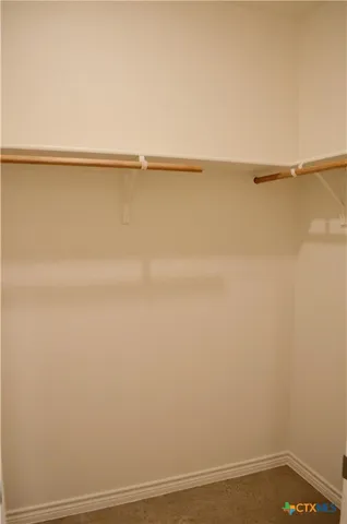 a view of small space with racks on the wall
