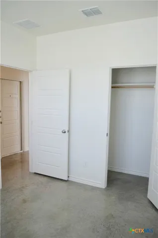 an empty room with closet