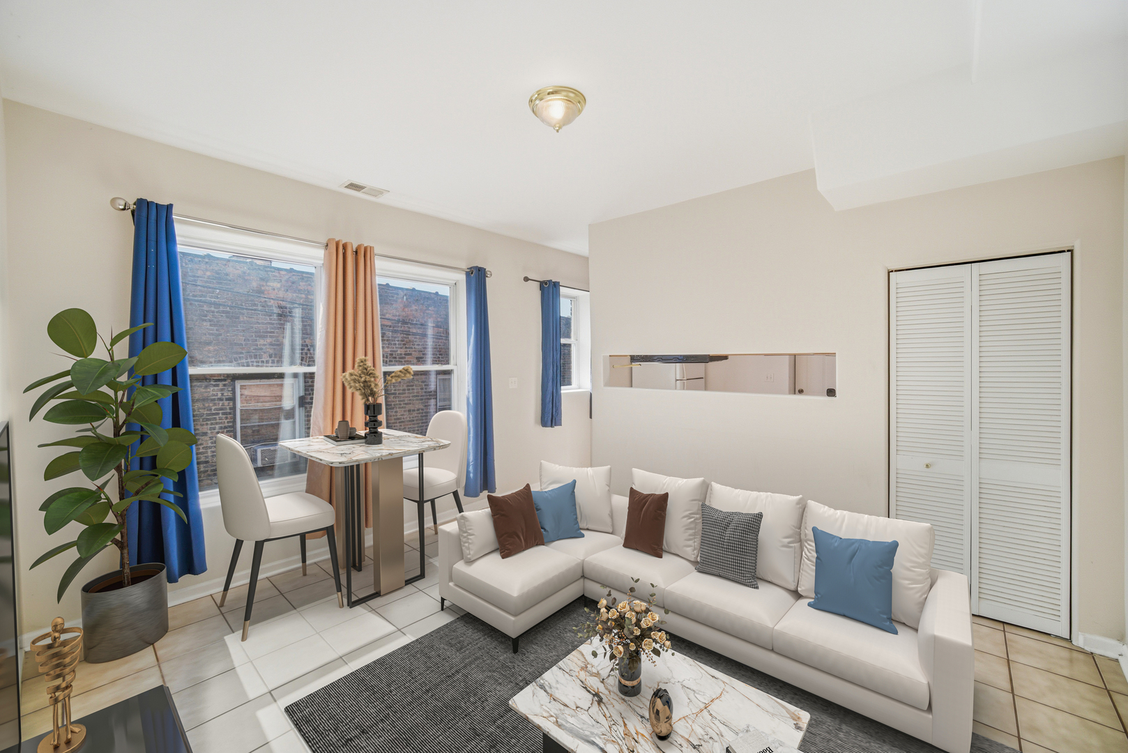 6712 South Ridgeland Avenue, Unit 3A Chicago, IL 60649 - Photo 6 of 14 a living room with furniture and a potted plant
