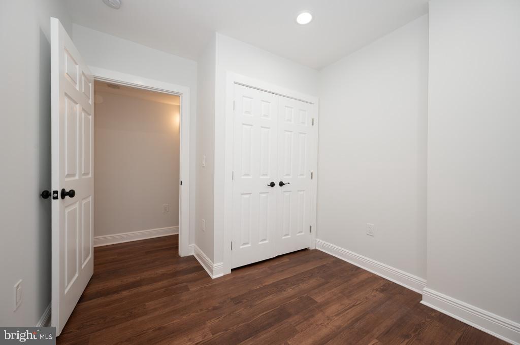 3321 11th Street Northwest, Unit 1 Washington, DC 20010 - Photo 4 of 10 a view of a hallway with wooden floor