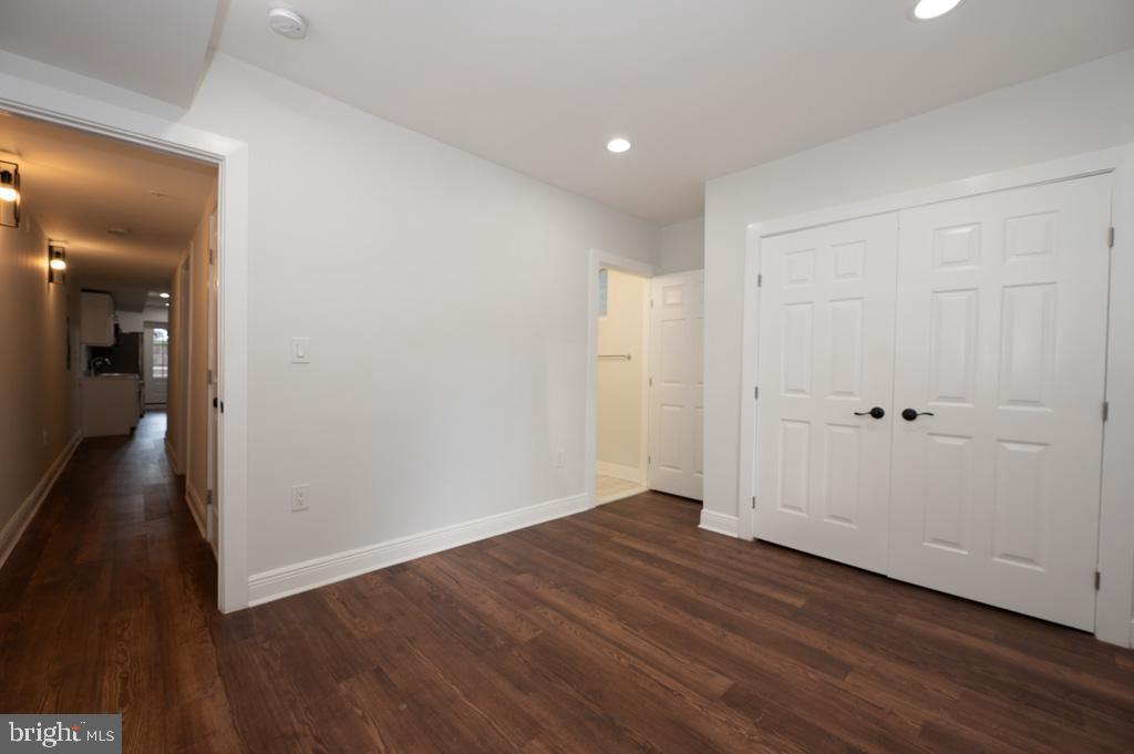 3321 11th Street Northwest, Unit 1 Washington, DC 20010 - Photo 7 of 10 wooden floor in an empty room with a window