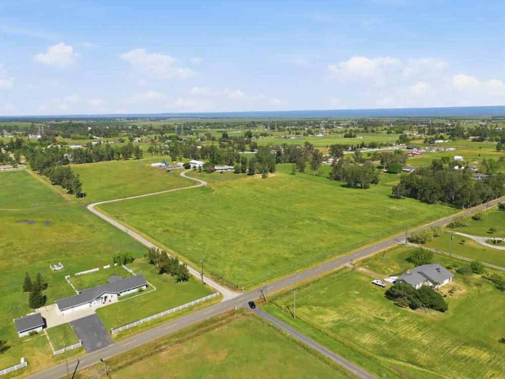 12001 Arno Road Wilton, CA 95693 - Photo 5 of 8 a view of an outdoor space and basketball court