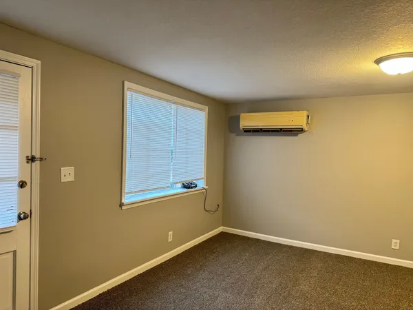 an empty room with a door