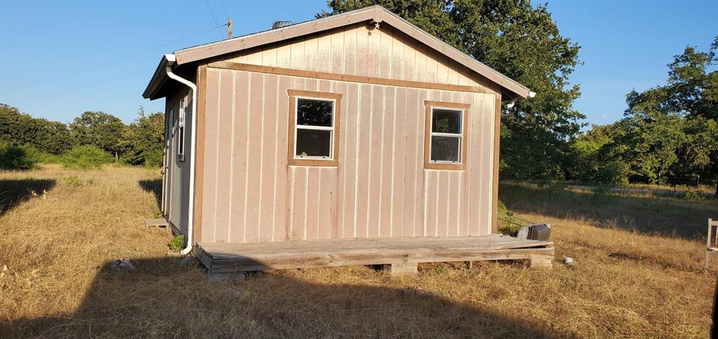 956 Cr-1990 Chico, TX 76431 - Photo 6 of 10 a view of a house with a yard