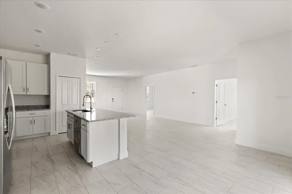 an empty room with windows