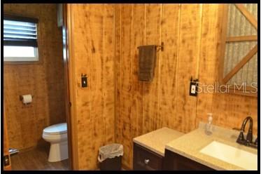 7019 Crooked Creek Lane Zolfo Springs, FL 33890 - Photo 16 of 51 a bathroom with a sink and a toilet