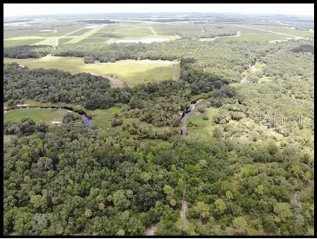 a view of beach with an outdoor space