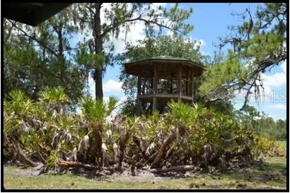 a view of a porch with a yard