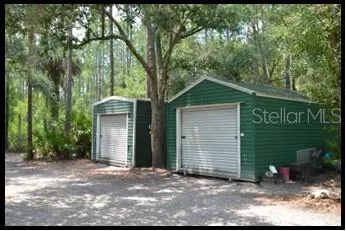 a view of a lake with a yard