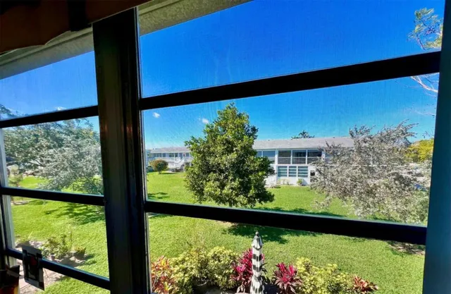 a view of a back yard from a window