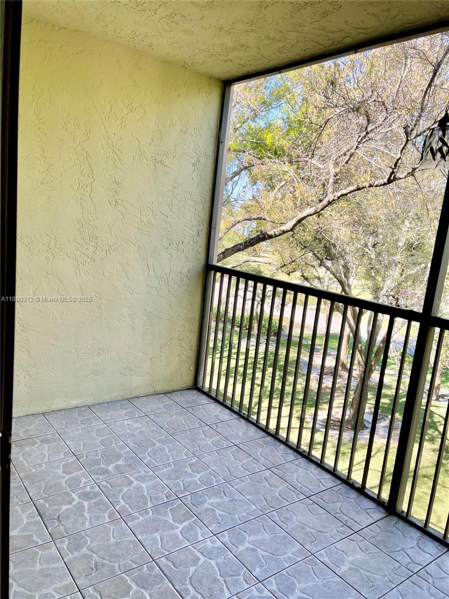 6800 Cypress Road, Unit 408 Plantation, FL 33317 - Photo 19 of 25 a view of a porch