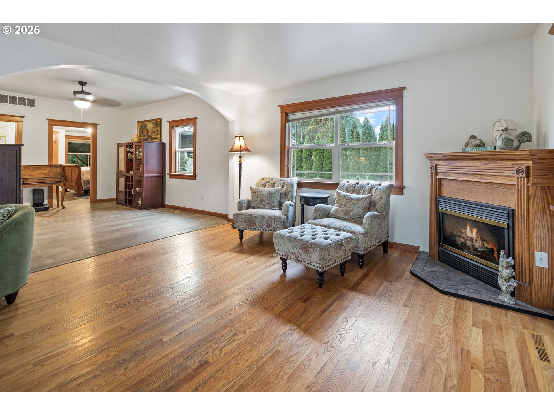 16326 Butteville Road Northeast Woodburn, OR 97071 - Photo 11 of 48 a living room with furniture and a fireplace
