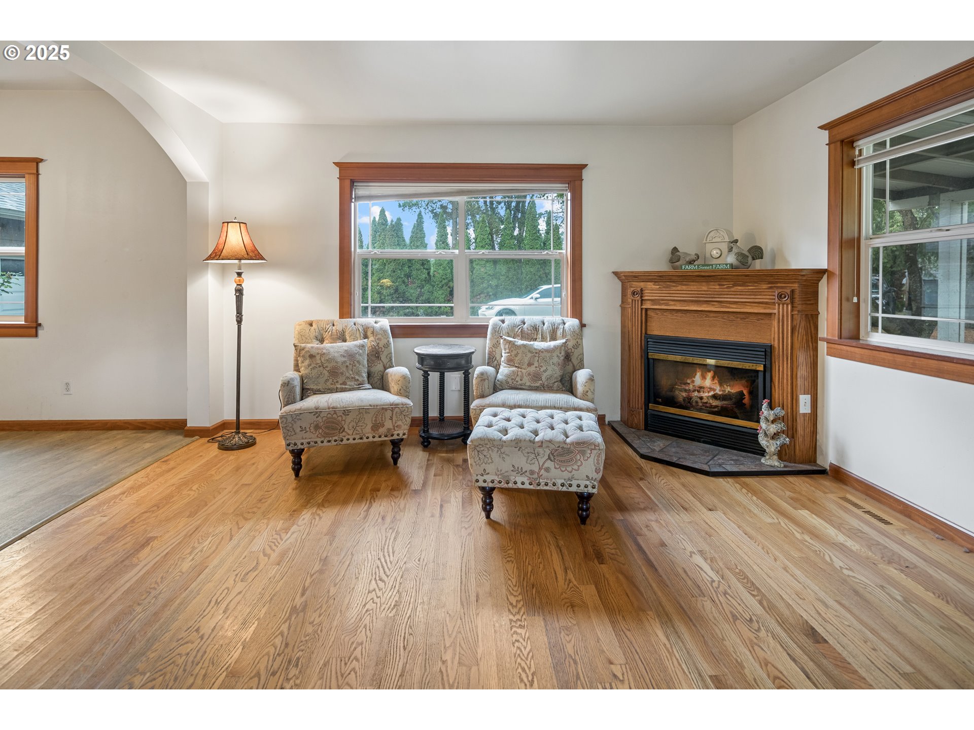 16326 Butteville Road Northeast Woodburn, OR 97071 - Photo 12 of 48 a living room with furniture and a fireplace
