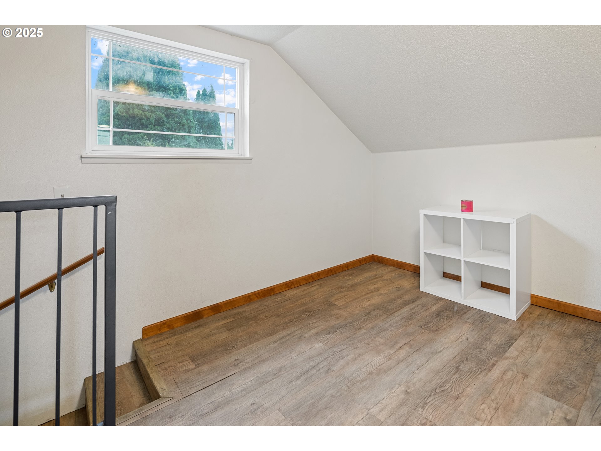 16326 Butteville Road Northeast Woodburn, OR 97071 - Photo 32 of 48 a view of an empty room with wooden floor and window