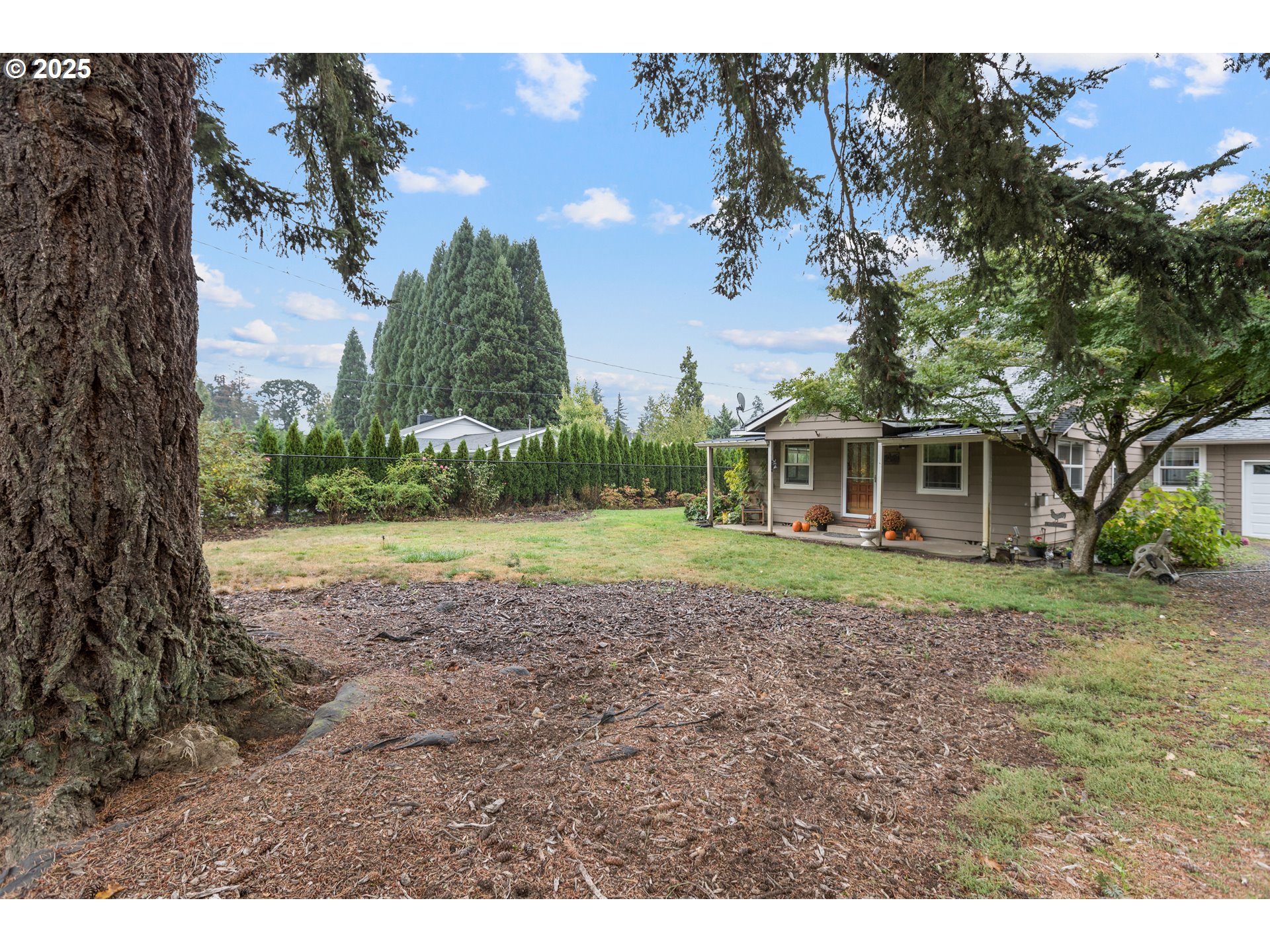 16326 Butteville Road Northeast Woodburn, OR 97071 - Photo 36 of 48 a view of a house with a yard