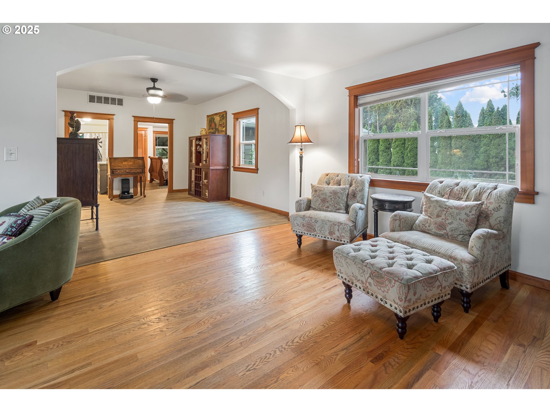 16326 Butteville Road Northeast Woodburn, OR 97071 - Photo 7 of 48 a living room with furniture and a wooden floor