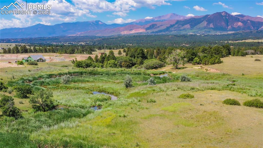 11590 Spectacular Bid Circle Colorado Springs, CO 80921 - Photo 40 of 49 a view of lake with mountain