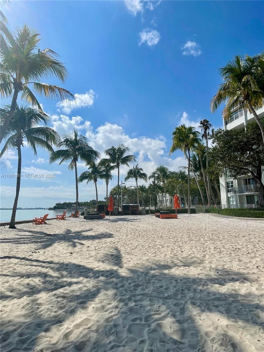 700 Northeast 63rd Street, Unit D203 Miami, FL 33138 - Photo 31 of 36 a view of a road with a building in the background